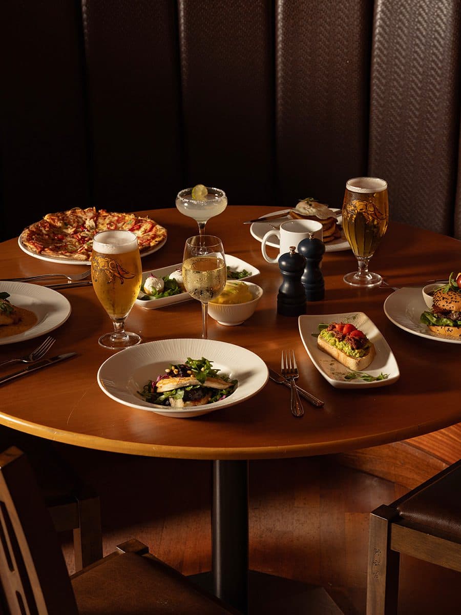 table full of food and drink at The Port