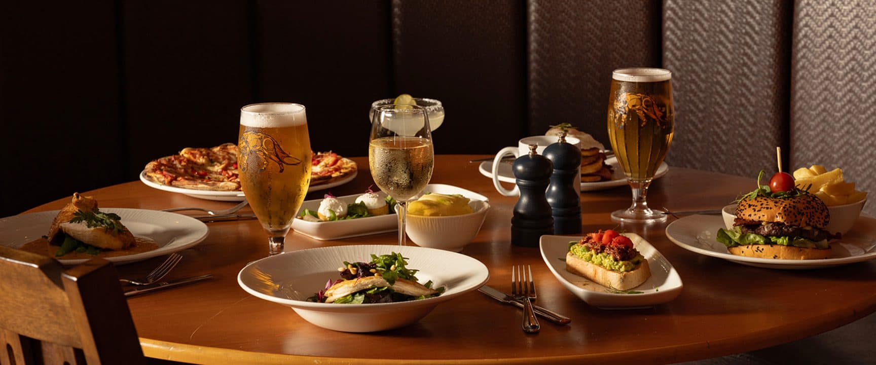 table full of food and drink at The Port